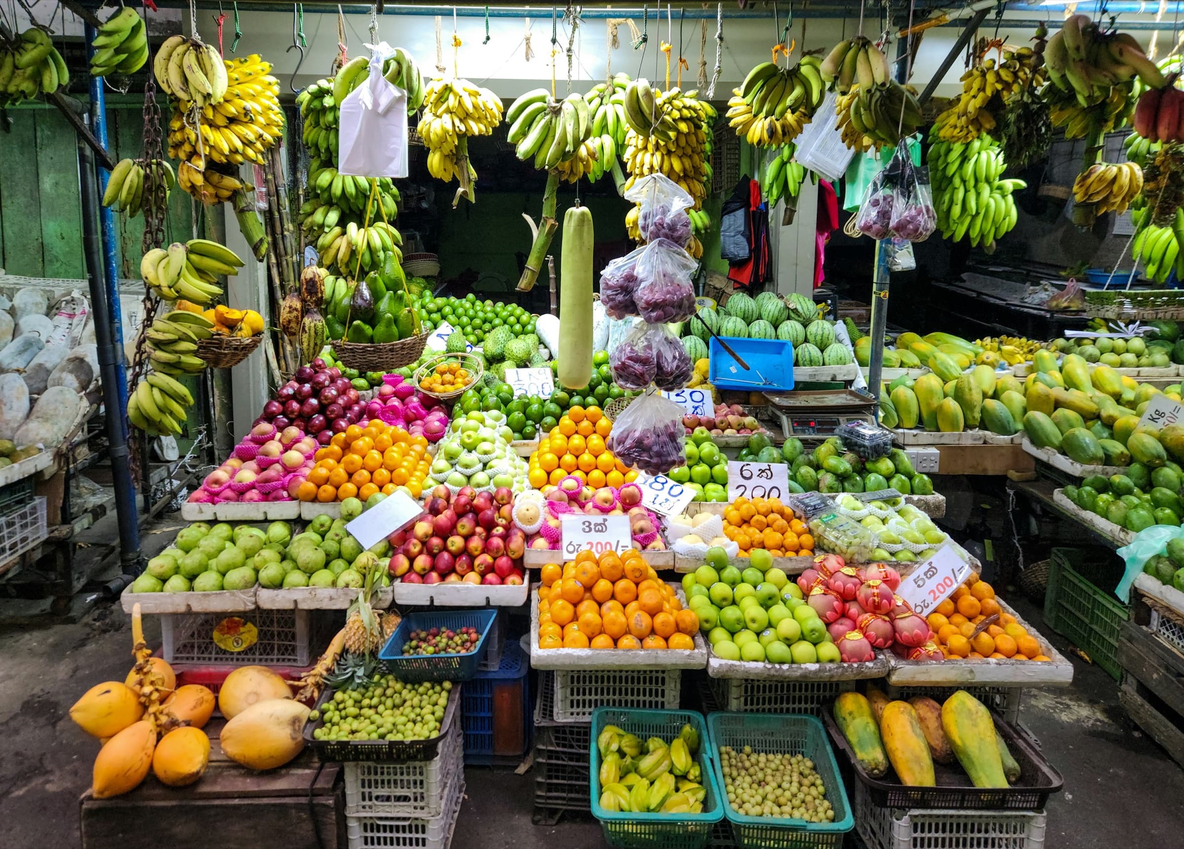 Colorful fruit stall inside Kandy Municipal Central Market