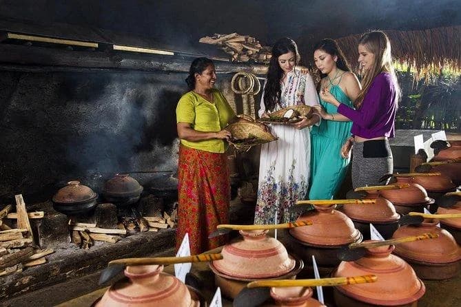 A Sri Lankan home kitchen with clay pots and traditional cooking utensils