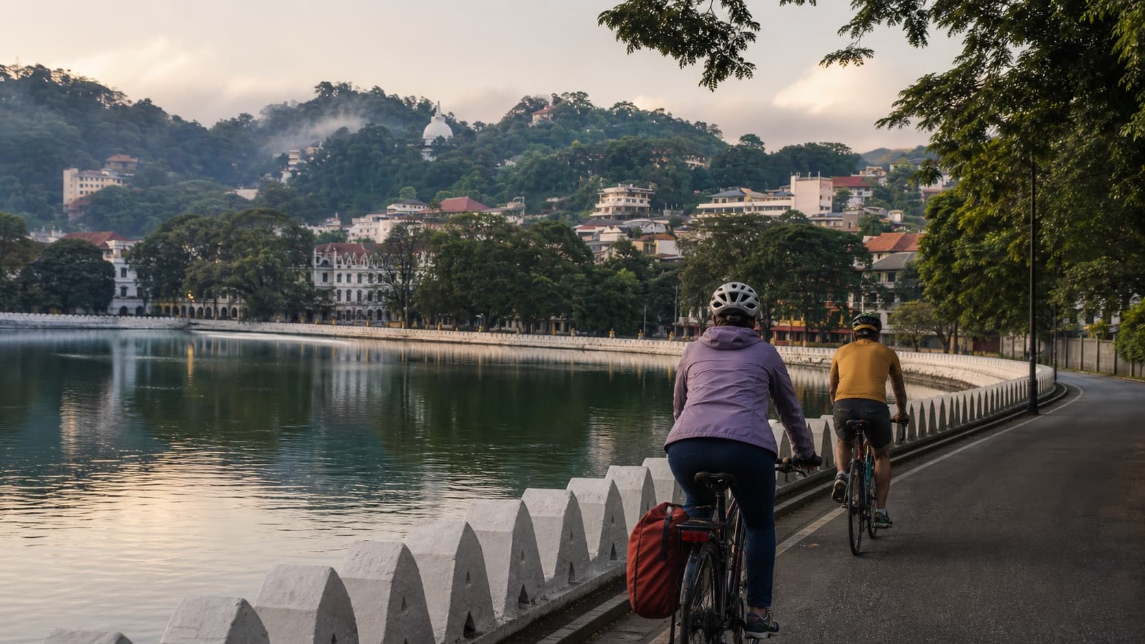 Cyclists riding beside Kandy Lake