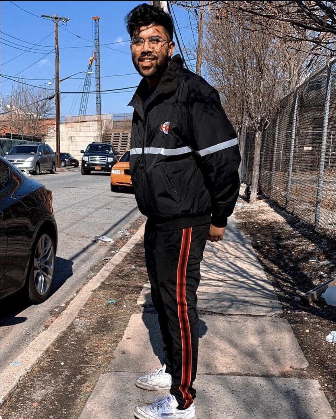 Yasantha Marasingha standing on a city sidewalk
